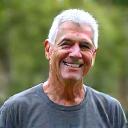 Portrait of David Rodriguez, 68, active and smiling.