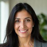 Portrait of Dr. Lena Khan, a friendly and knowledgeable woman in her 40s